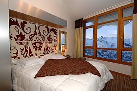 intérieur d'une chambre résidence Edenarc pour vacances aux Arcs